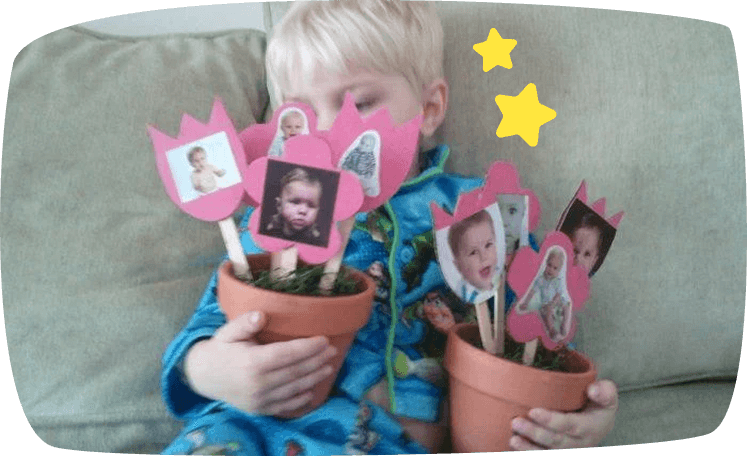 Barn med blomsterpotter med bilder